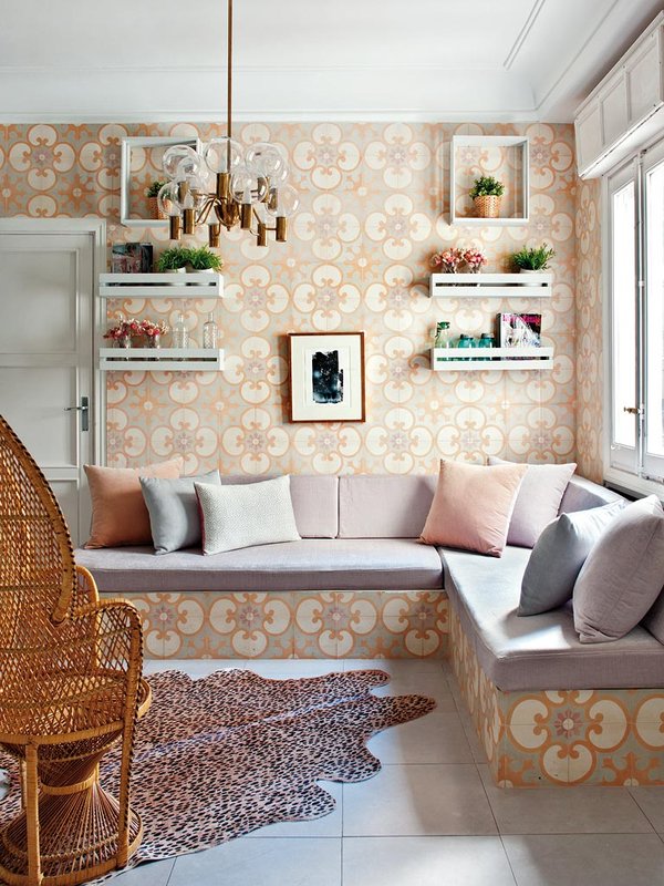 Living-Pink-Madrid-apt-vintage-femme-elegance-glam-tiled-wall-seating-area-cheetah-hide-rug-peacock-chair-vintage-pendant-lamp